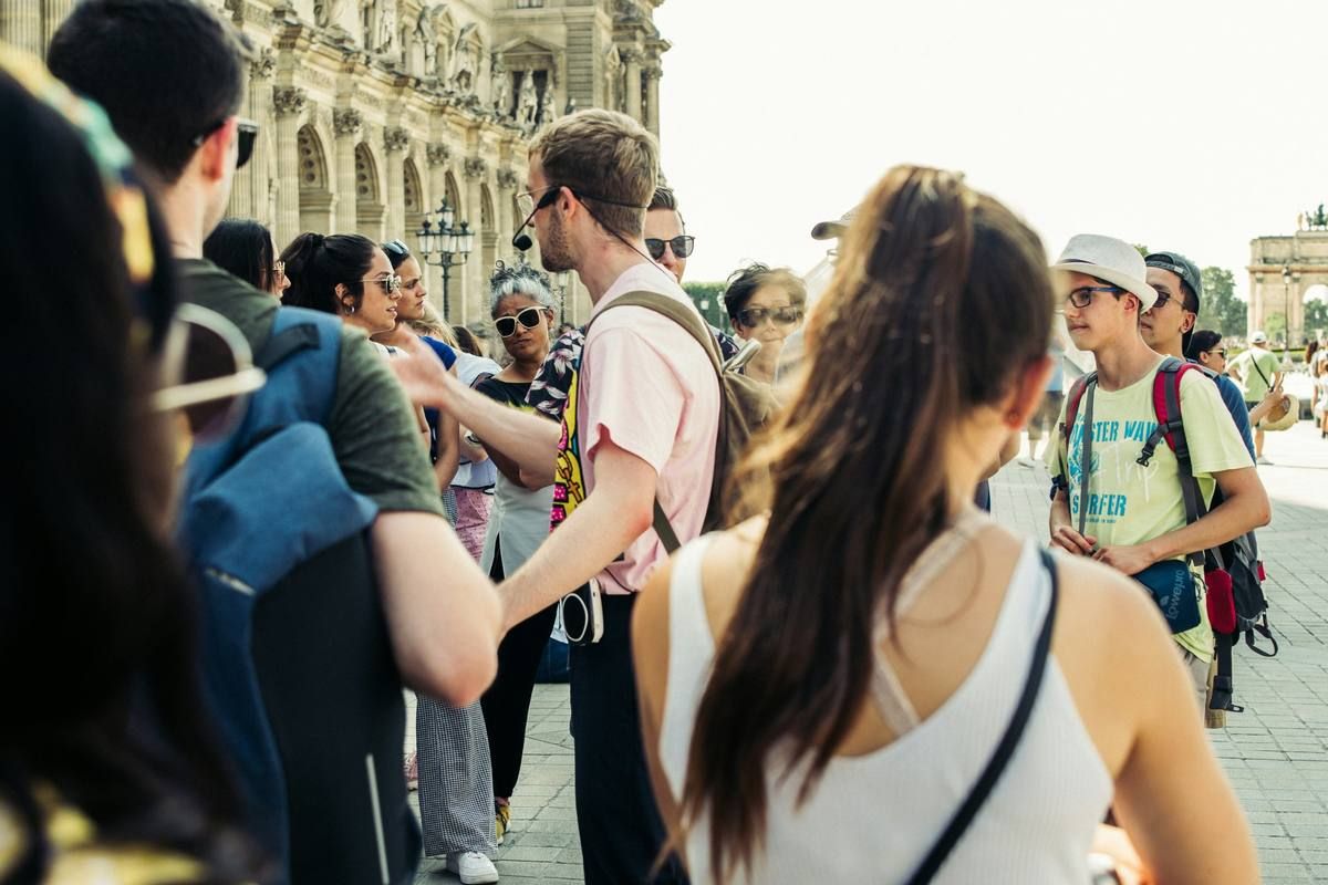A guide talking to a tour group